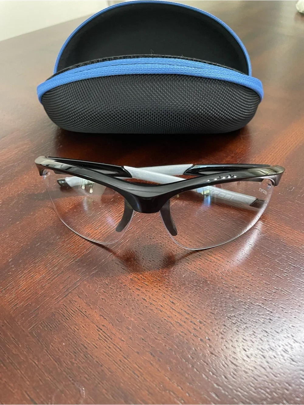 Tifosi Veloce Black Semi-Rimless sport  Eyewear with black and blue hard case